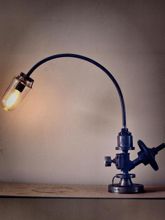 Steampunk desk or dresser lamp: with Armcarbon filament lamphourglass and and cable dimmer.