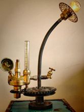 Steampunk desk or dresser lamp for sale: with Armcarbon filament lamphourglass and and cable dimmer.