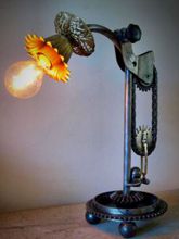 Steampunk desk or dresser lamp for sale: Adjustable and rotatable lamp.  Armcarbon filament lamphourglass and and cable dimmer.