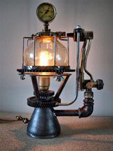 Steampunk desk or dresser lamp: with Armcarbon filament lamphourglass and and cable dimmer.