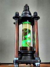 Steampunk Art Alchemy lamp for sale: Decorative piece of art with taxidermy larvae’s..